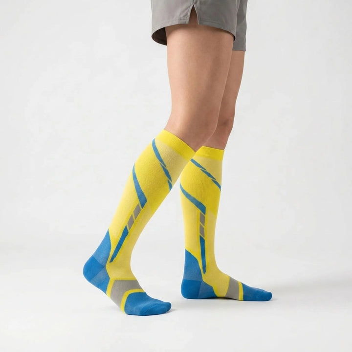 Supportive women's knee-high athletic socks, ideal for running, gym & intense workouts.