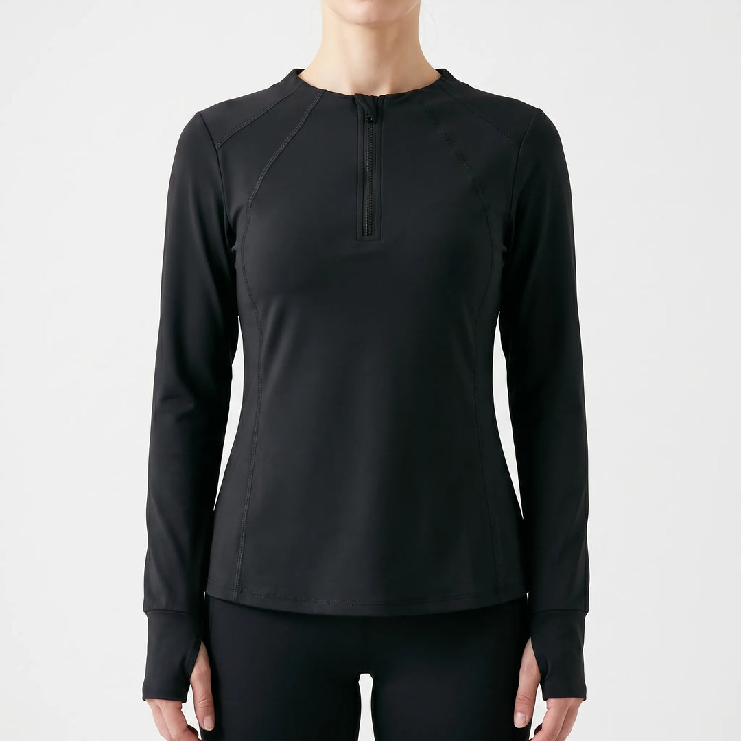Lightweight women's athletic quarter-zip performance top. Ideal long-sleeve gym wear for comfortable fitness.