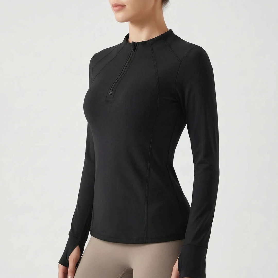 Women's performance quarter-zip long-sleeve top. Versatile activewear & running top for gym & fitness apparel.