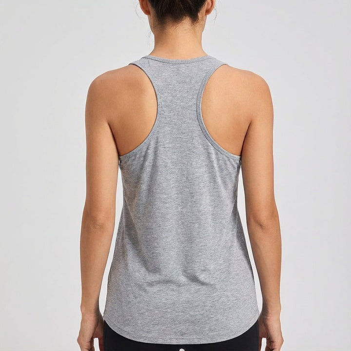 Solid color women's sports top with a flexible fit, perfect for demanding gym sessions.