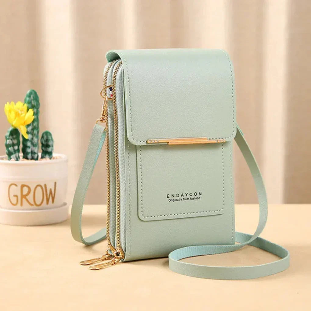 Women's phone crossbody bag with a dedicated touchscreen pocket, great for daily essentials.