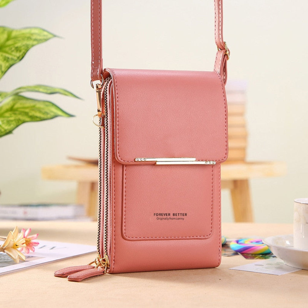 Versatile small phone purse for women. Wear as shoulder or crossbody bag with touchscreen pocket for convenience.