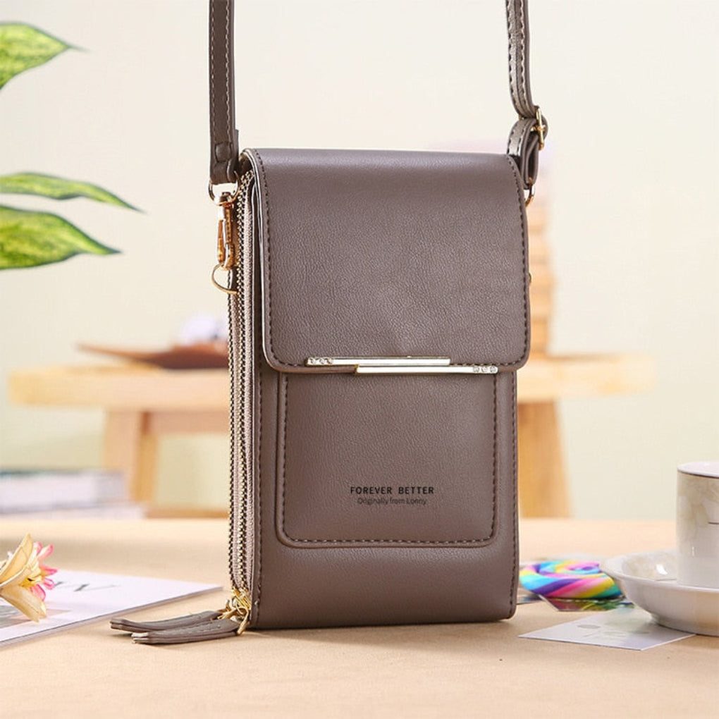 Fashionable women's mini bag with a dedicated phone holder & clear touchscreen window. Great for on-the-go.