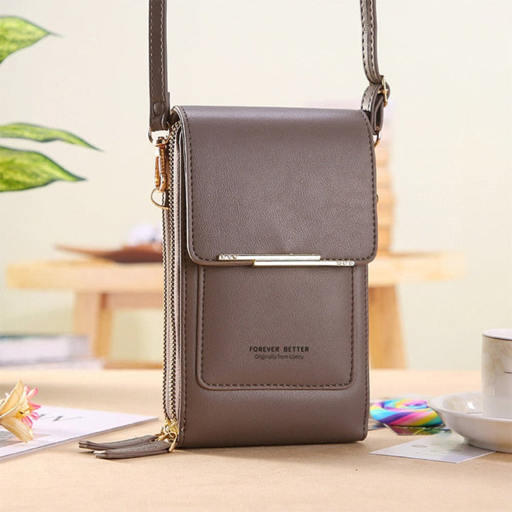 Fashionable women's mini bag with a dedicated phone holder & clear touchscreen window. Great for on-the-go.