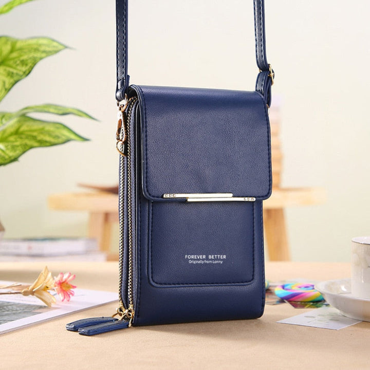 Elegant women's clutch purse/crossbody for phone. Features a touchscreen window for easy access. Daily essential.
