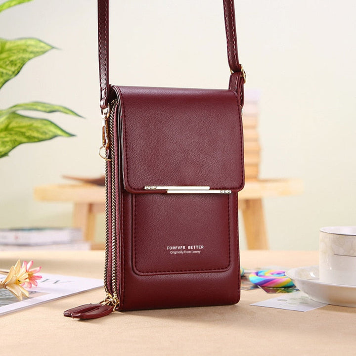 Compact women's shoulder bag designed for smartphones. Includes a front touchscreen compartment. Ideal small purse.