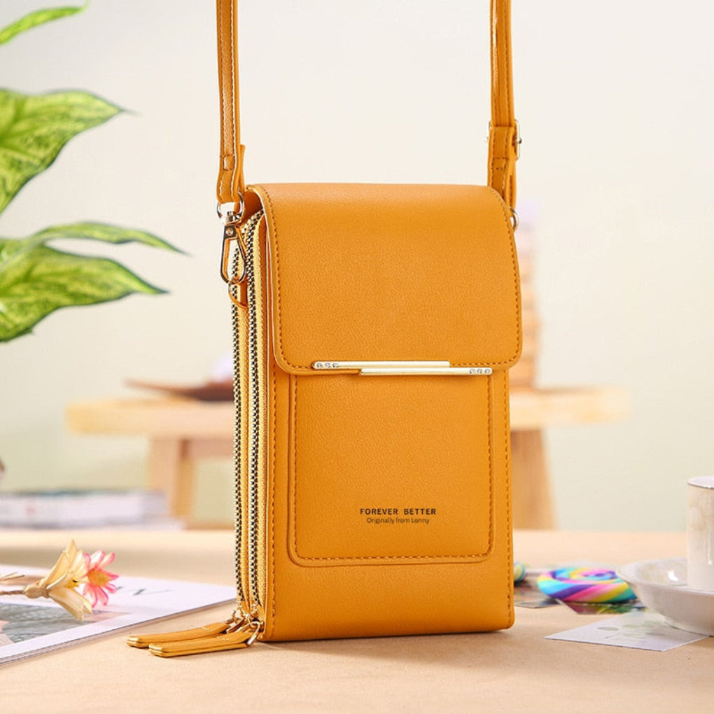 Women's versatile phone holder bag with clear touchscreen panel. Can be a shoulder bag, crossbody, or clutch.