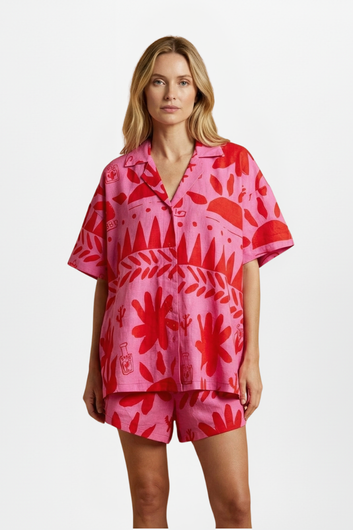 Relaxed fit women's two-piece tropical print summer outfit with camp collar shirt & matching high-waisted shorts.