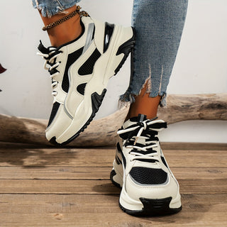 Black women's platform sneakers, trendy fashion footwear with a thick sole for elevated style & comfort.