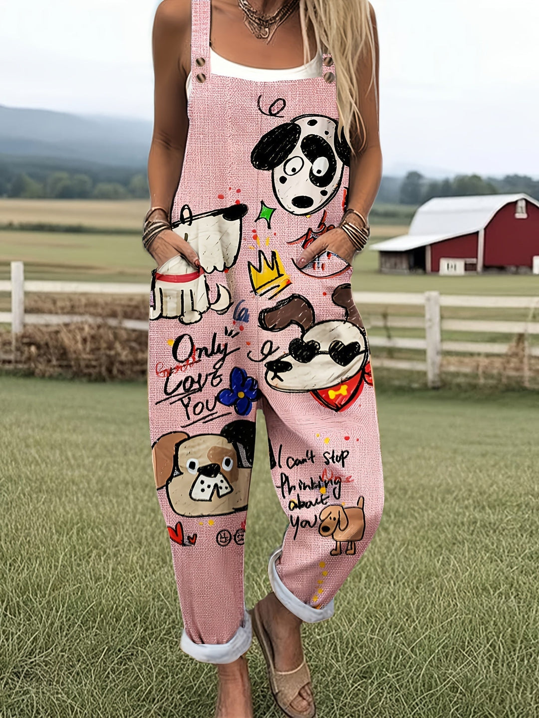 Women's playful dog print jumpsuit, adjustable straps, wide leg, pockets. Casual summer fashion.