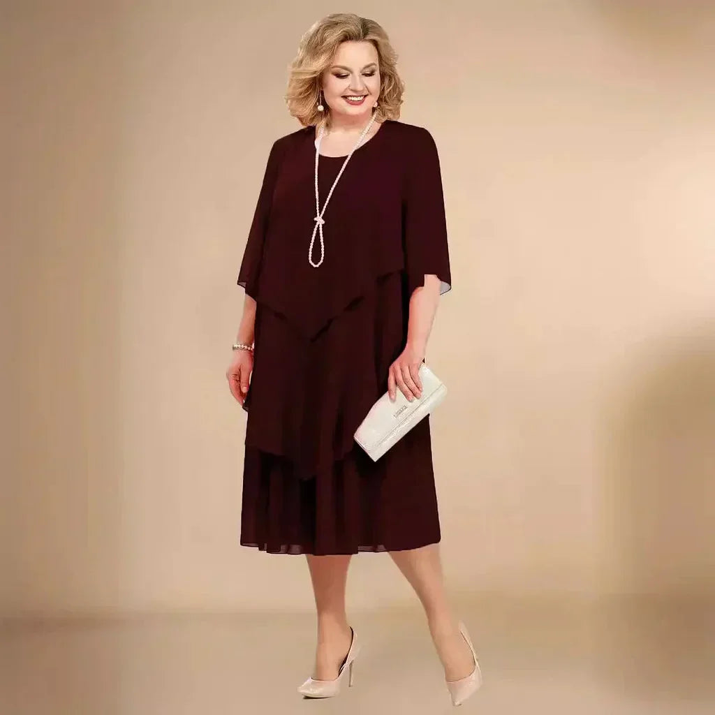 Women's plus size formal dress with asymmetrical hem, ideal for elegant events.