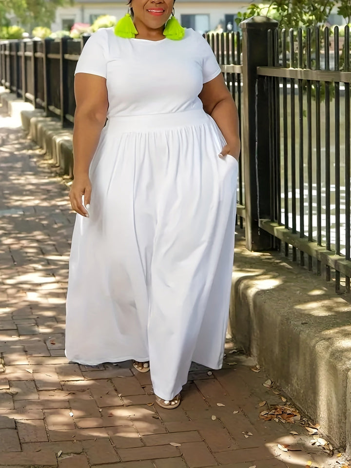 Women's plus size flowy maxi dress with short sleeves, perfect for comfortable summer wear.