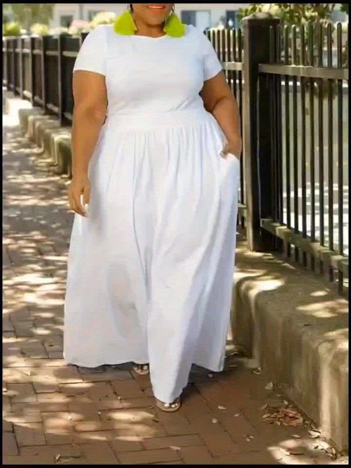 Women's plus size short sleeve maxi dress, showcasing a beautiful flowy silhouette.
