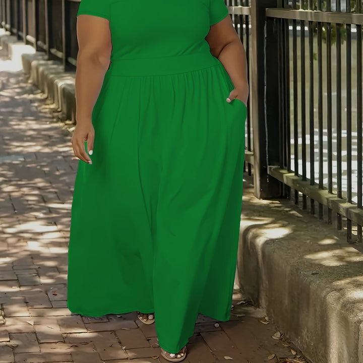 Vacation essential: Plus size flowy maxi dress with short sleeves for women.