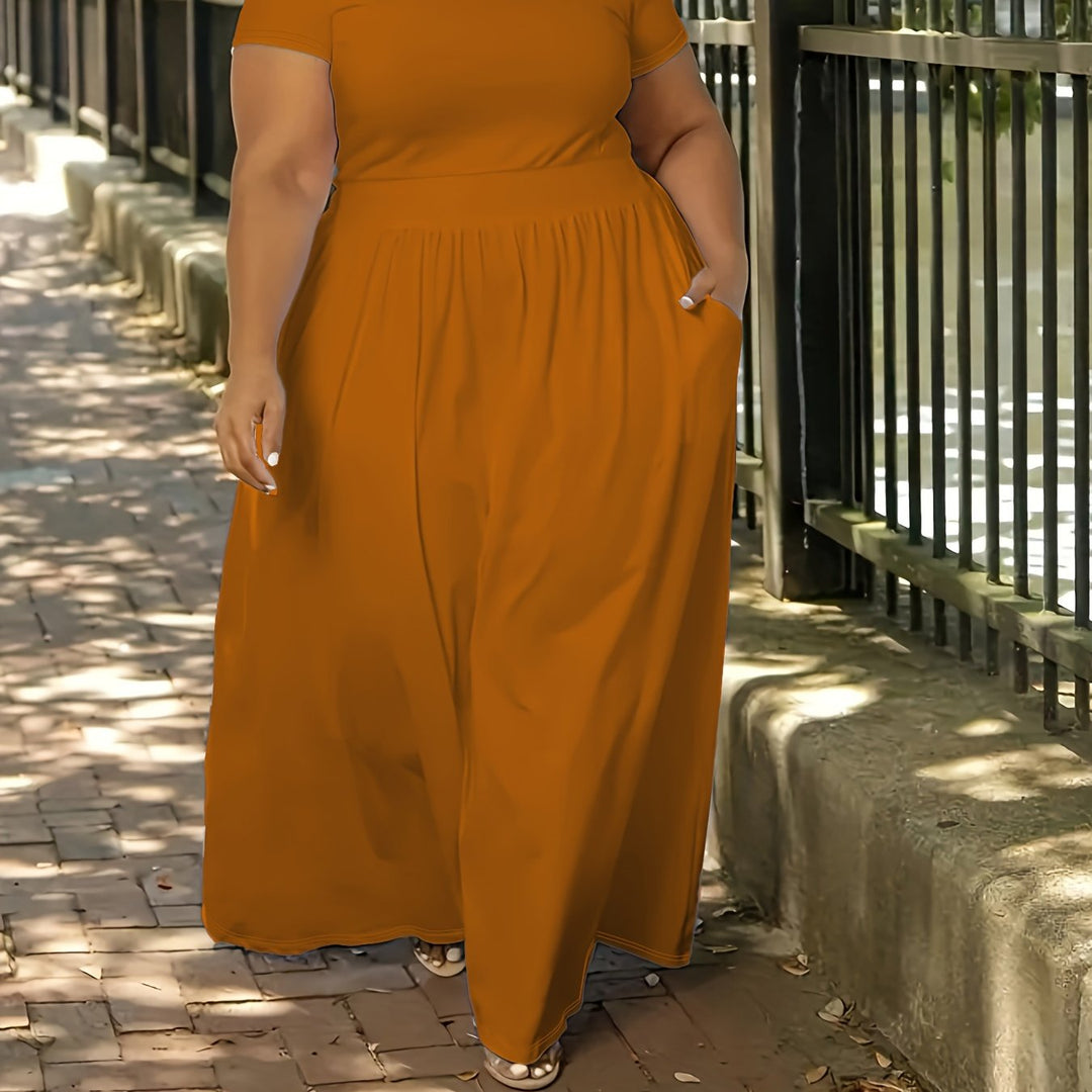 Curvy women's short sleeve maxi dress, offering a flattering and flowy fit for vacation.