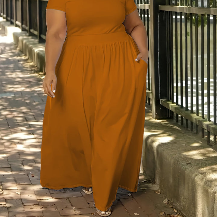 Curvy women's short sleeve maxi dress, offering a flattering and flowy fit for vacation.