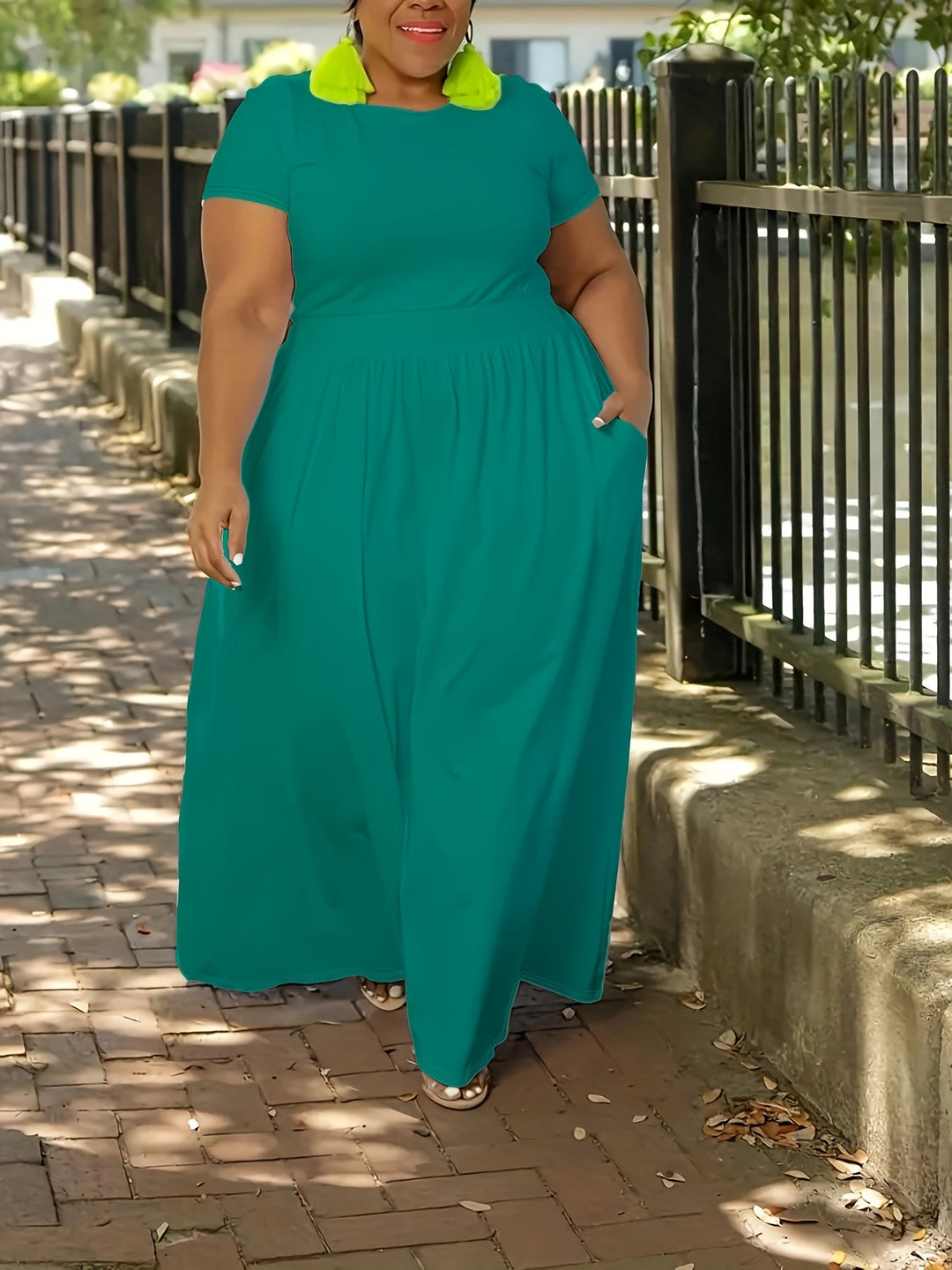 Plus size women's flowy summer dress with short sleeves, a comfortable party or casual outfit.