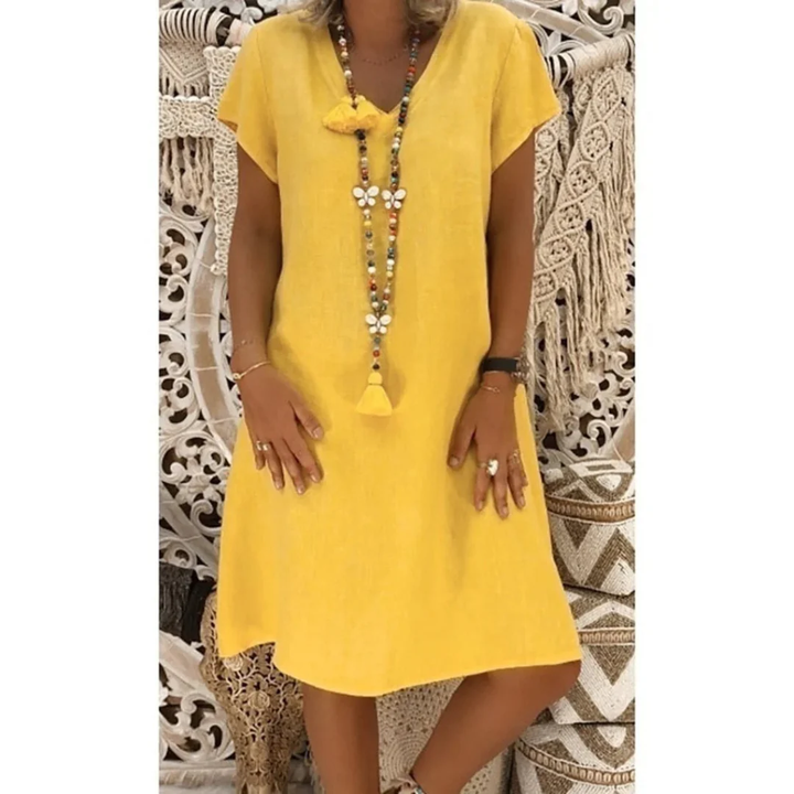Casual women's summer dress, relaxed fit plus size, perfect for everyday comfort in warm weather.