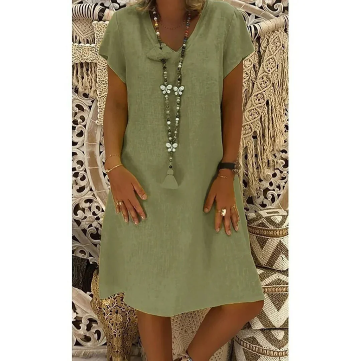 Relaxed fit plus size women's summer dress, designed for comfort and casual style in vibrant colors.