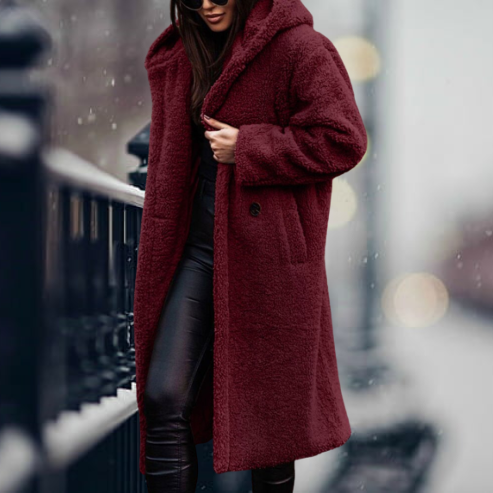 Comfortable women's plush hooded winter coat. Cozy elegant long sleeve outerwear for chilly days.