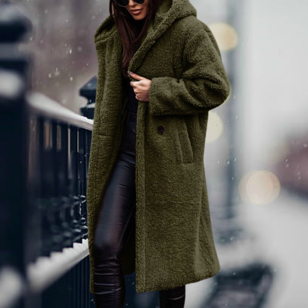 Stylish women's elegant hooded winter coat. Long sleeve plush outerwear for cozy warmth.