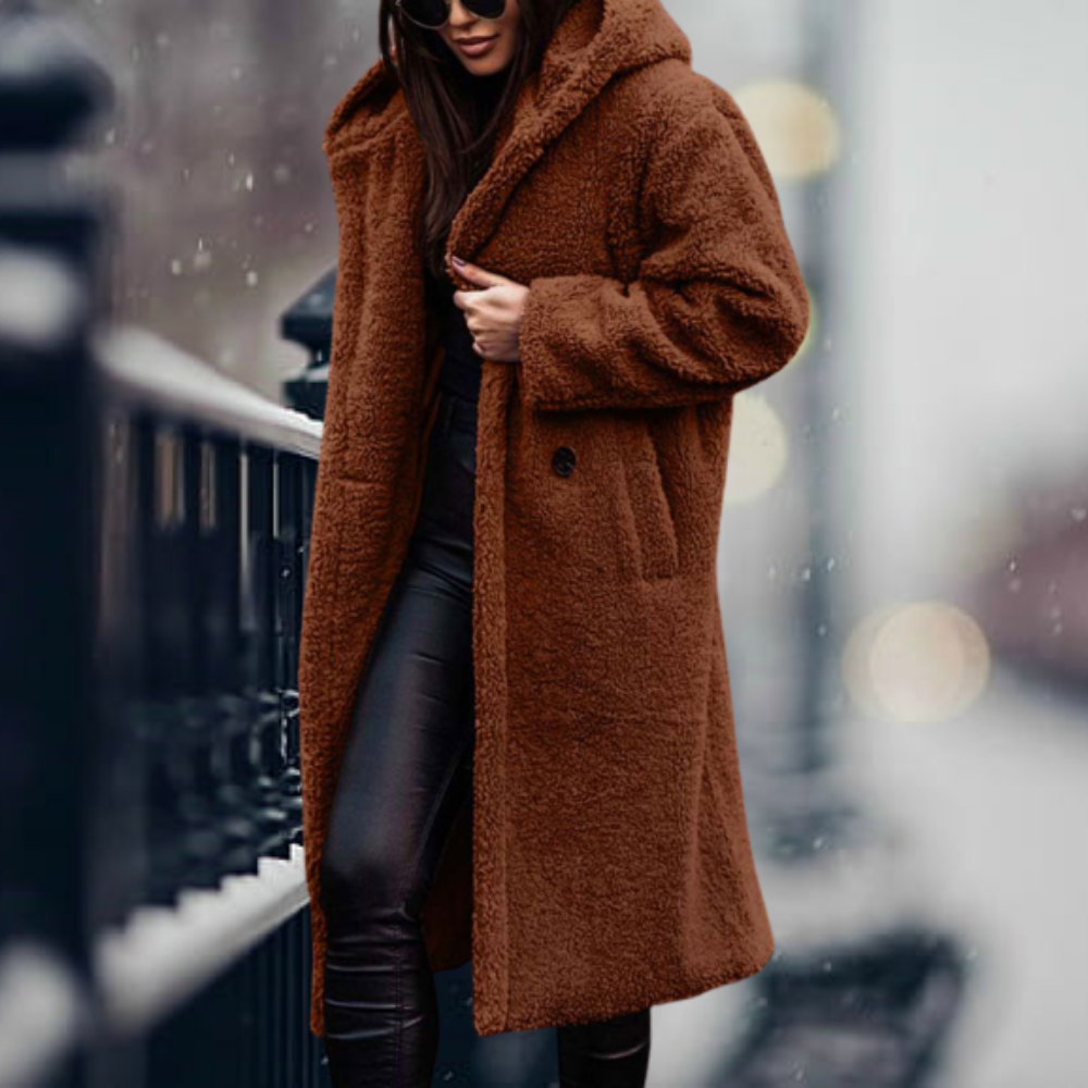 Chic women's plush hooded winter coat with long sleeves. Elegant & cozy fashion for warmth.