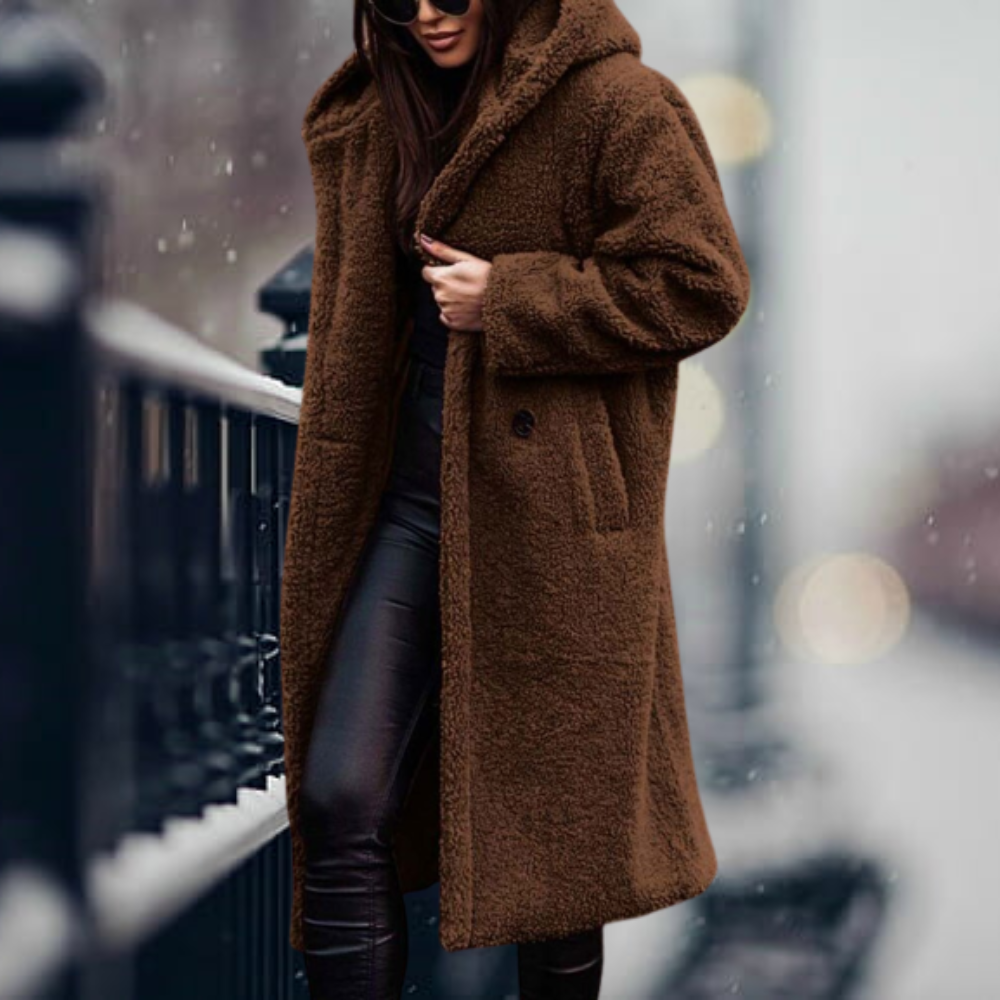 Elegant women's plush hooded winter coat. Sophisticated warm outerwear, perfect for stylish comfort.