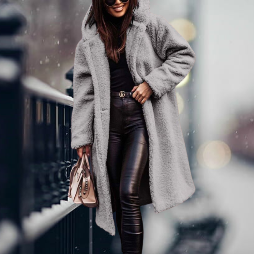 Women's plush hooded winter jacket. Cozy & stylish long sleeve outerwear, perfect for cold days.