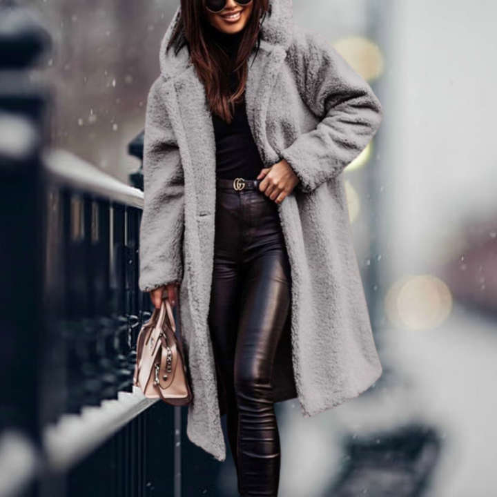 Women's plush hooded winter jacket. Cozy & stylish long sleeve outerwear, perfect for cold days.