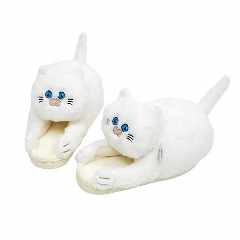 Cute women's plush cat slippers hugging feet, offering warm cozy comfort & anti-slip sole.