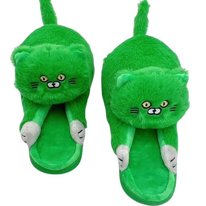 Close-up of cute plush cat design on women's cozy slippers, soft fabric and animal style.