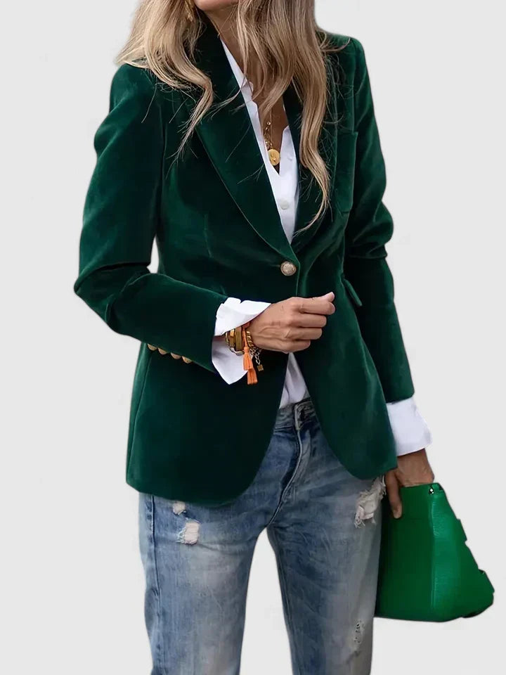 Tailored women's blazer, plush fabric, striking gold buttons. A chic single-breasted jacket for smart casual fashion.
