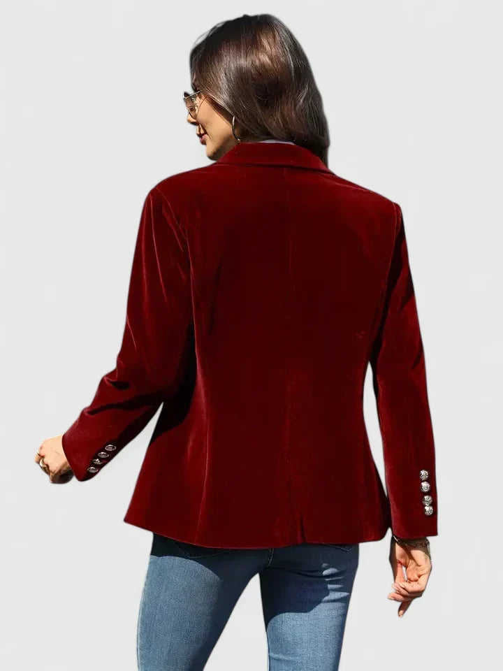Luxurious women's plush blazer, single-breasted, featuring ornate gold buttons. Tailored fit for a sophisticated look.