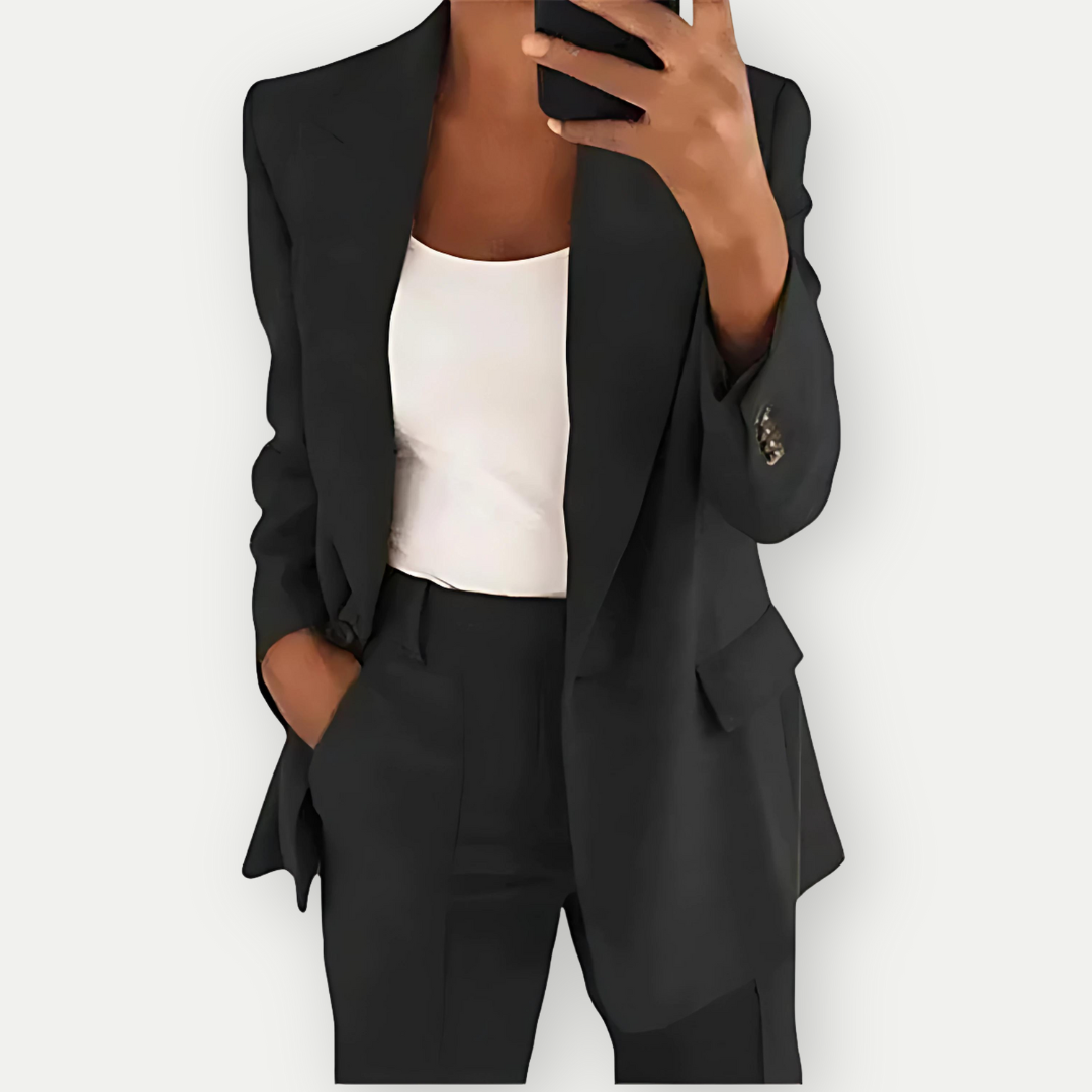 Chic women's tailored blazer and pants set, ideal for sophisticated office wear, business casual, or formal events.