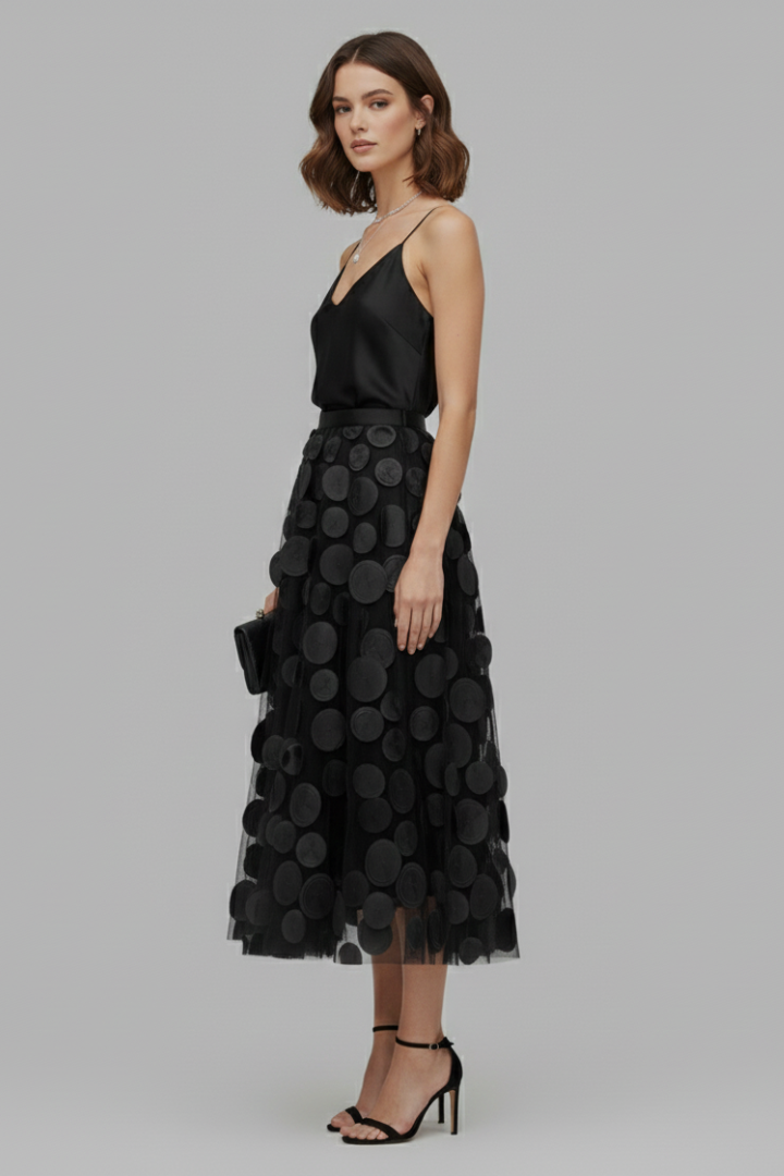 Model wearing a stylish polka dot full skirt, ideal for casual chic, summer style or elegant evening events.