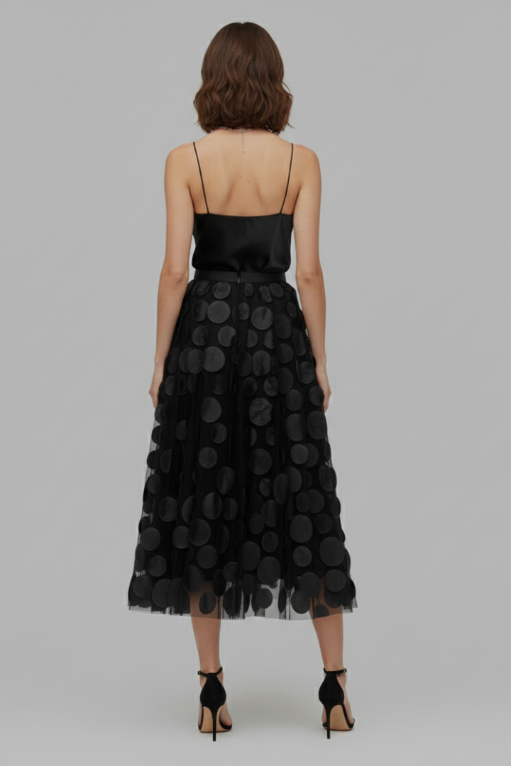 Layered, flowy polka dot full skirt for women. An A-line design, perfect for elegant summer style and parties.