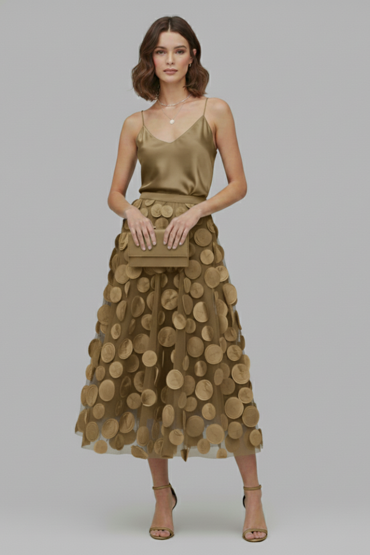 Elastic waist polka dot full skirt, featuring a layered, A-line design. Great for casual summer chic.