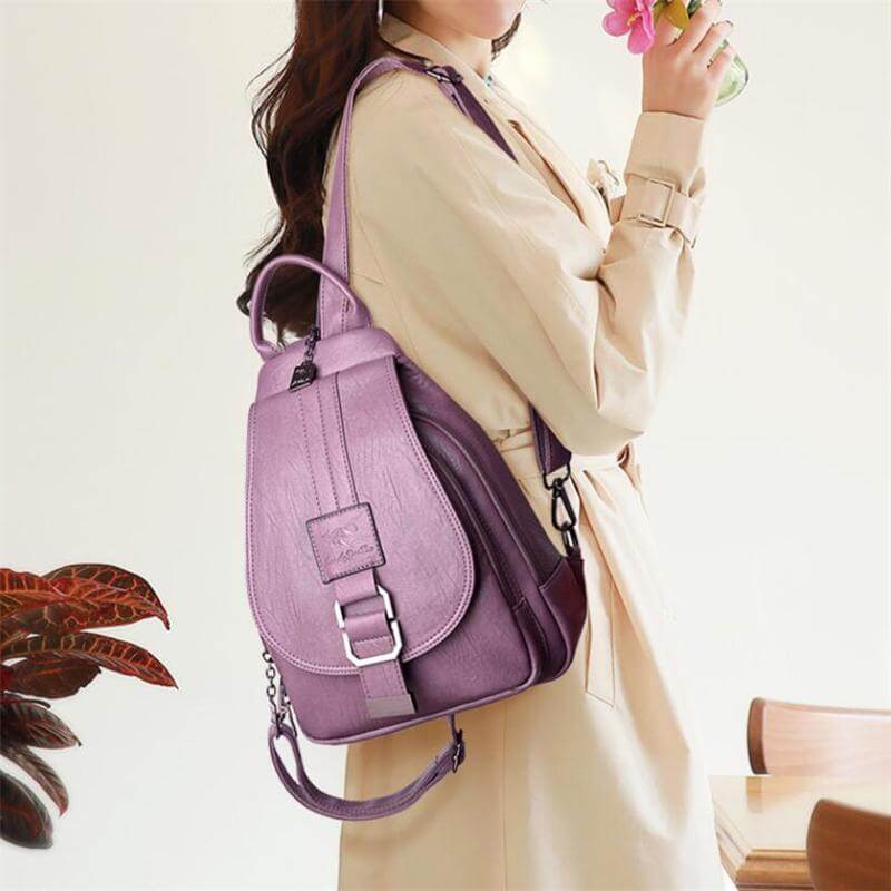 Sophisticated women's water-resistant leather backpack, a versatile luxury travel bag.