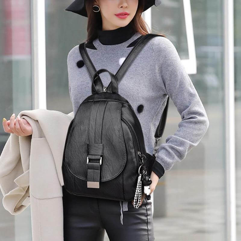 High-quality women's water-resistant leather backpack, designed for daily wear.