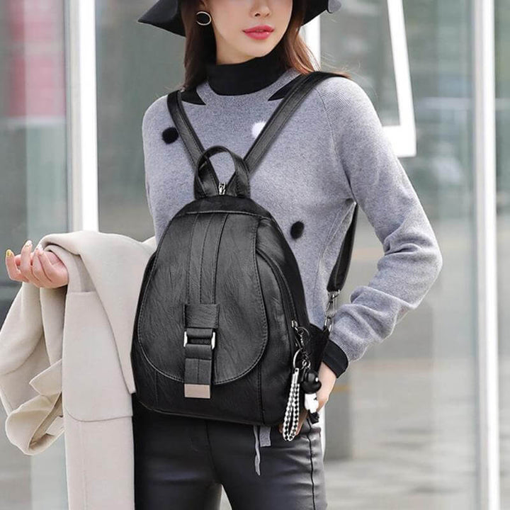 High-quality women's water-resistant leather backpack, designed for daily wear.