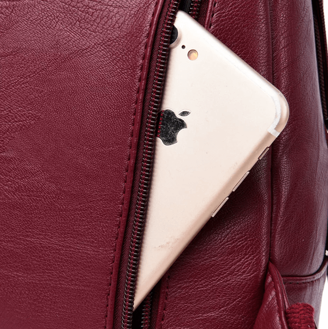 Elegant women's premium leather backpack, water-resistant, a practical luxury accessory.