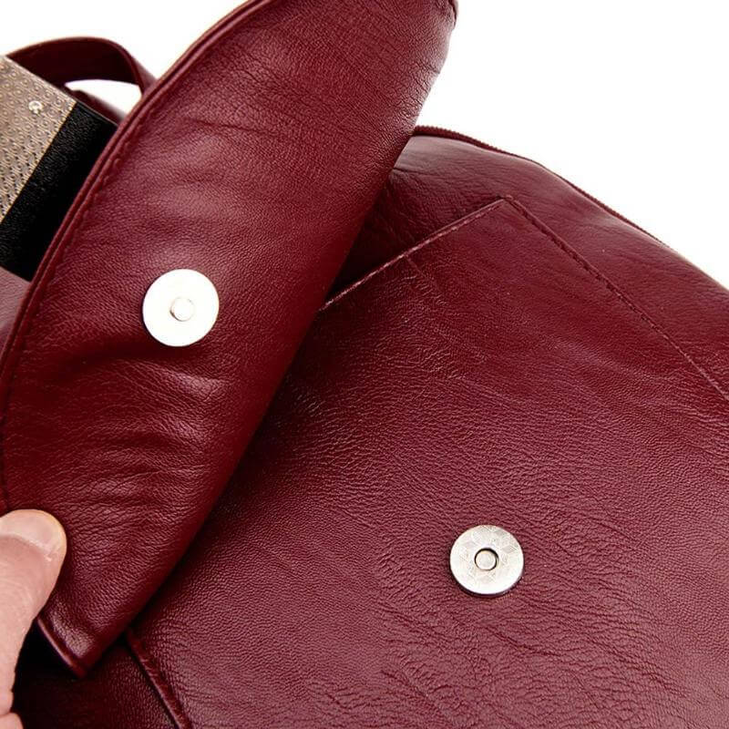 Durable women's water-resistant leather backpack, a stylish choice for any adventure.