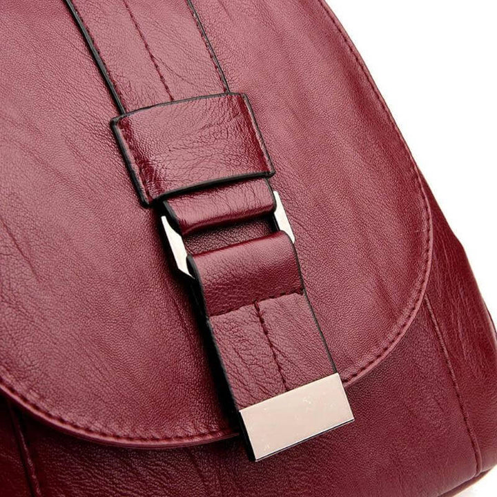 Chic women's water-resistant premium leather backpack, enhancing any outfit.