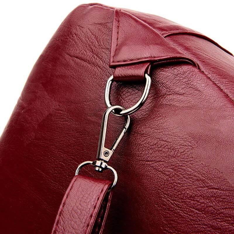 Sophisticated women's water-resistant leather backpack, combining durability and style.