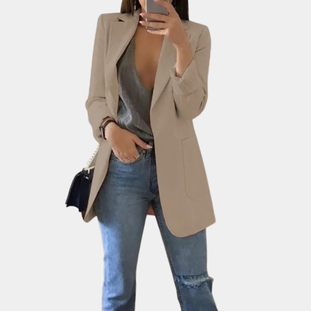 Tailored long blazer for women, offering a sleek, professional fit. Essential versatile outerwear piece.