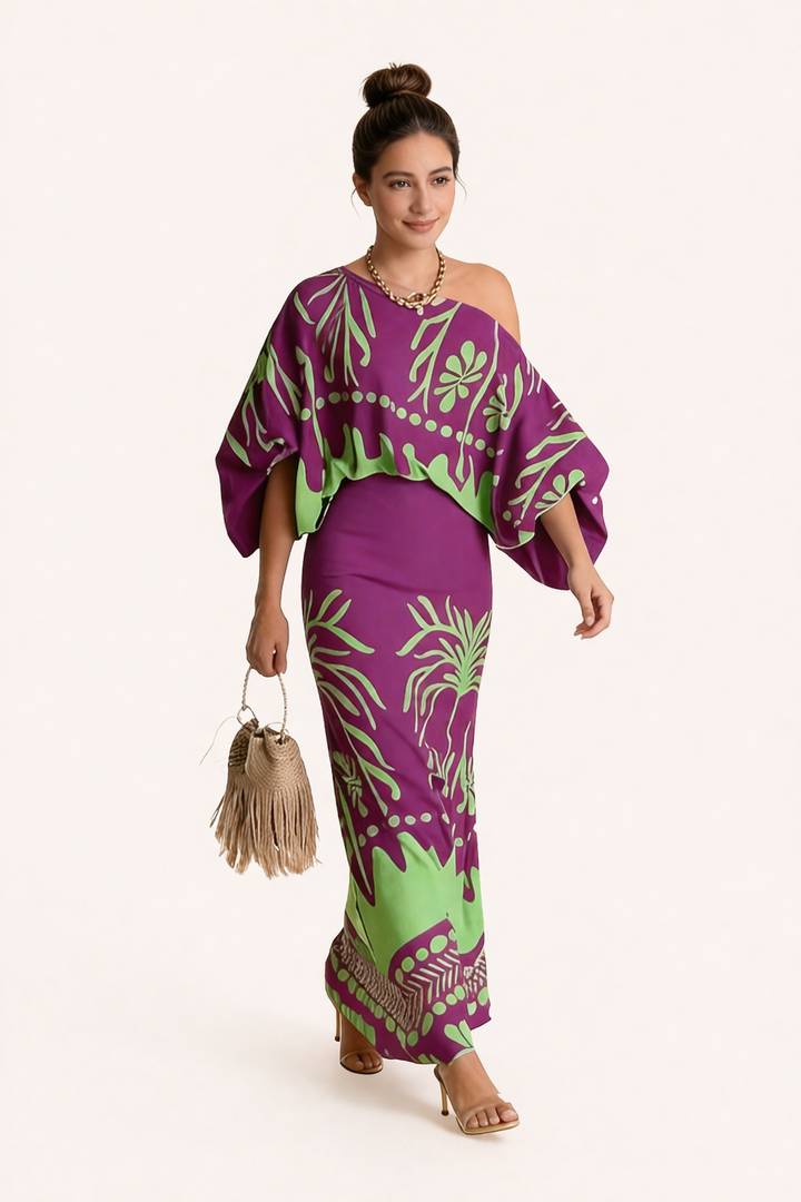Flowy women's two-piece set featuring a vibrant printed maxi skirt & elegant blouse, ideal for casual summer outfits.