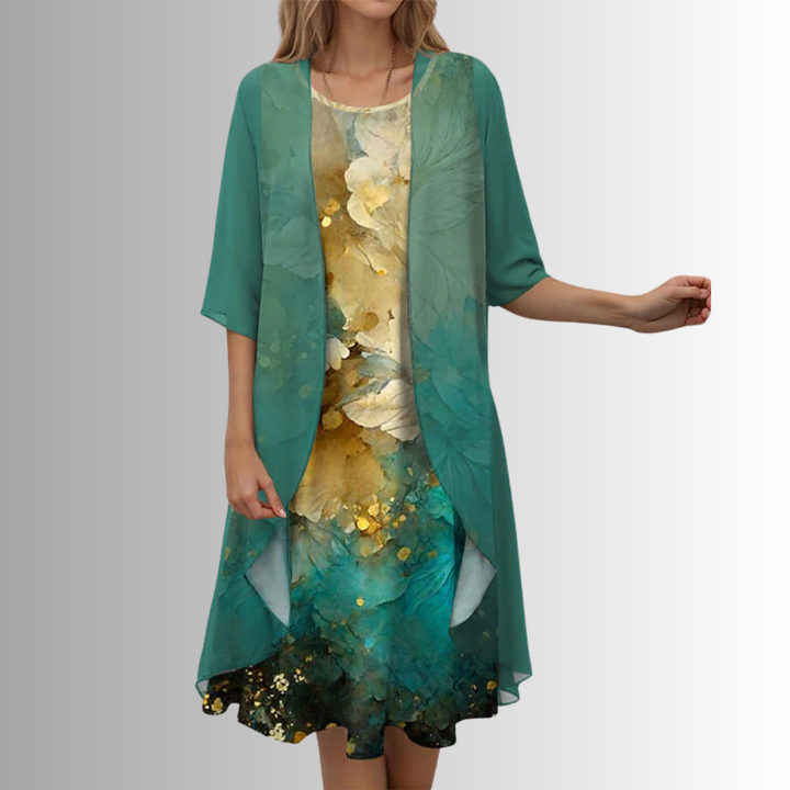 Spring/Summer women's dress: vibrant printed layered open-front midi with a unique flowy, uneven hem.