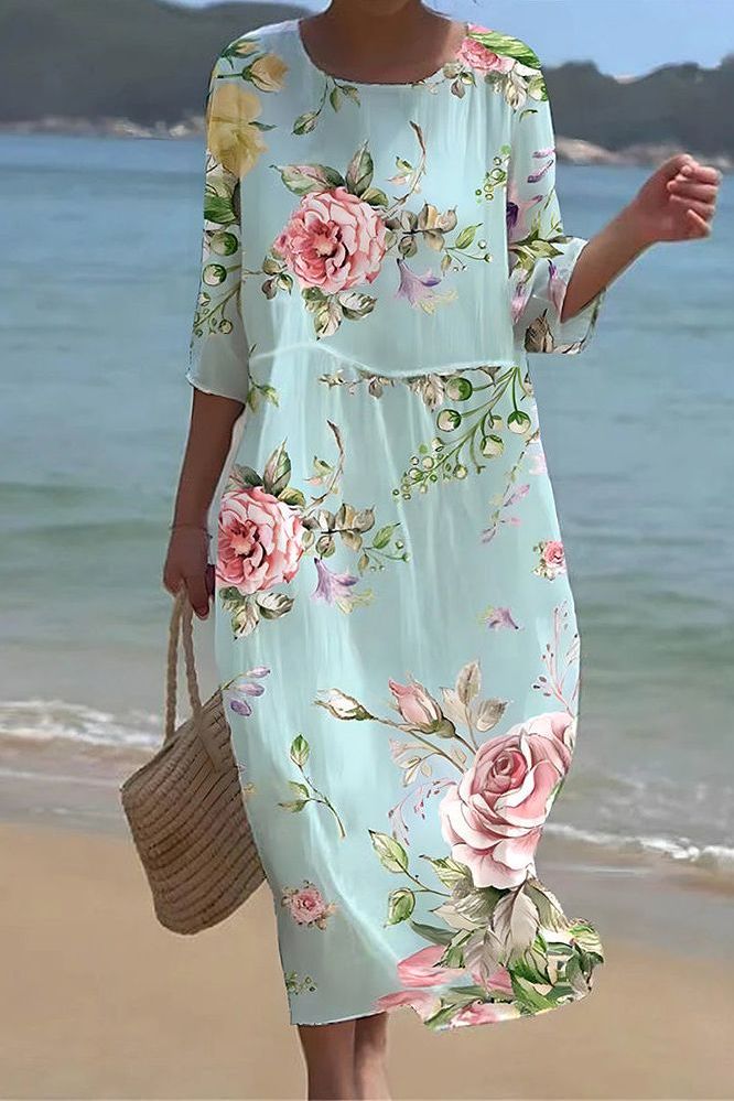 Women's printed relaxed midi dress. Stylish, comfortable patterned dress perfect for casual spring and summer fashion.