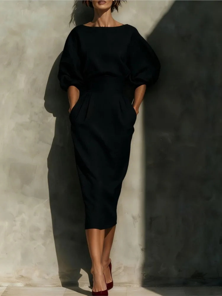 Modest women's puff sleeve midi dress with pockets, great for everyday wear, comfortable and chic for any season.