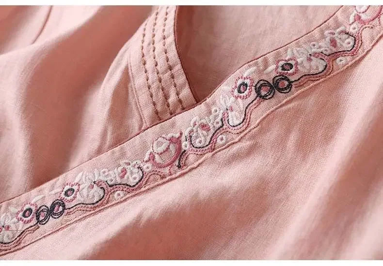 Stylish purple patterned blouse, women's relaxed fit, elegant embroidery.